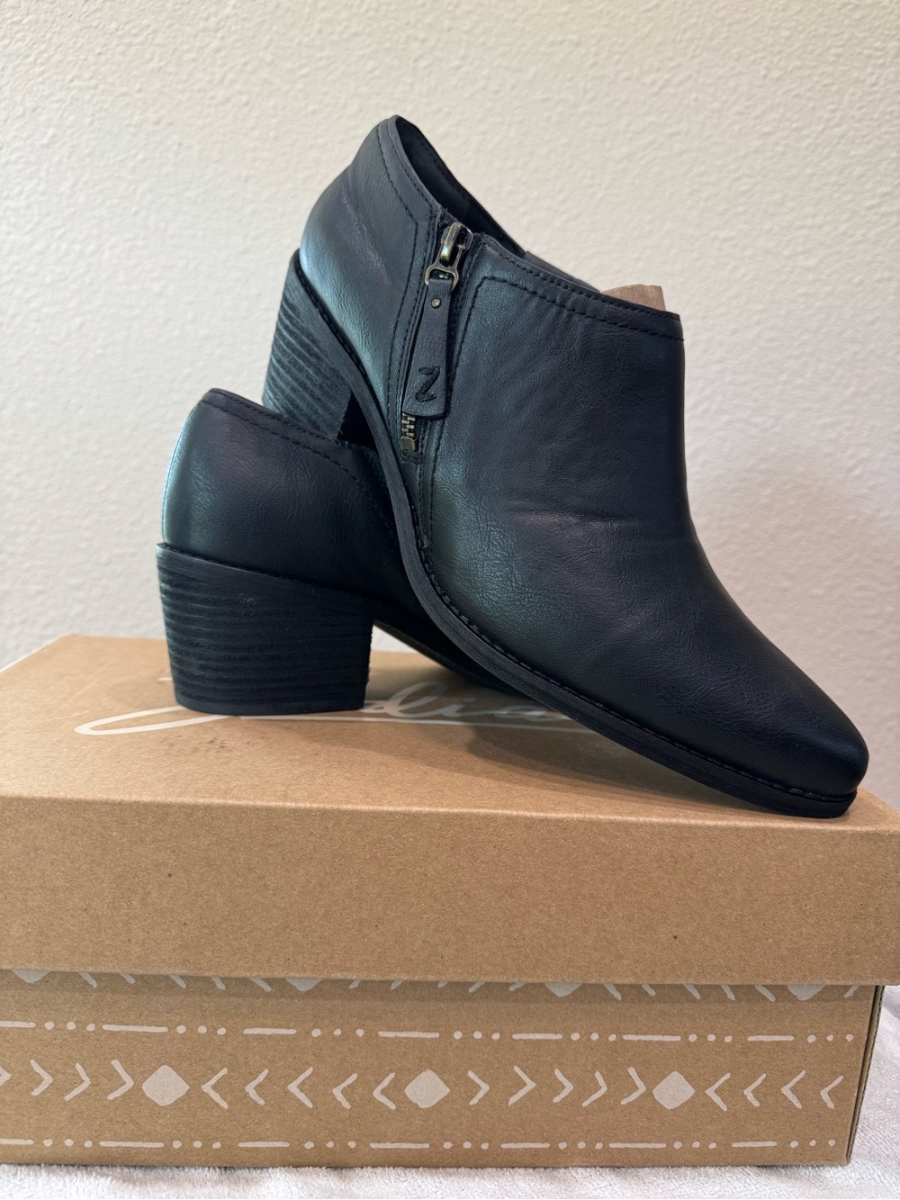 Zodiac Black Leather Ankle Booties with Stacked Heel
